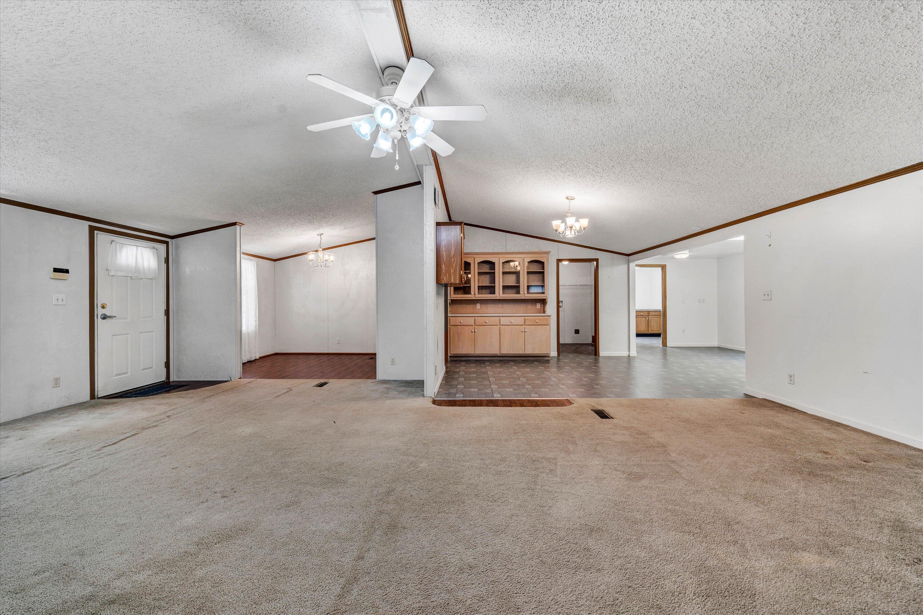 5232 Old Forge Road Rocky Mount, VA 24151 - Photo 41 of 41 a view of an empty room with a chandelier fan