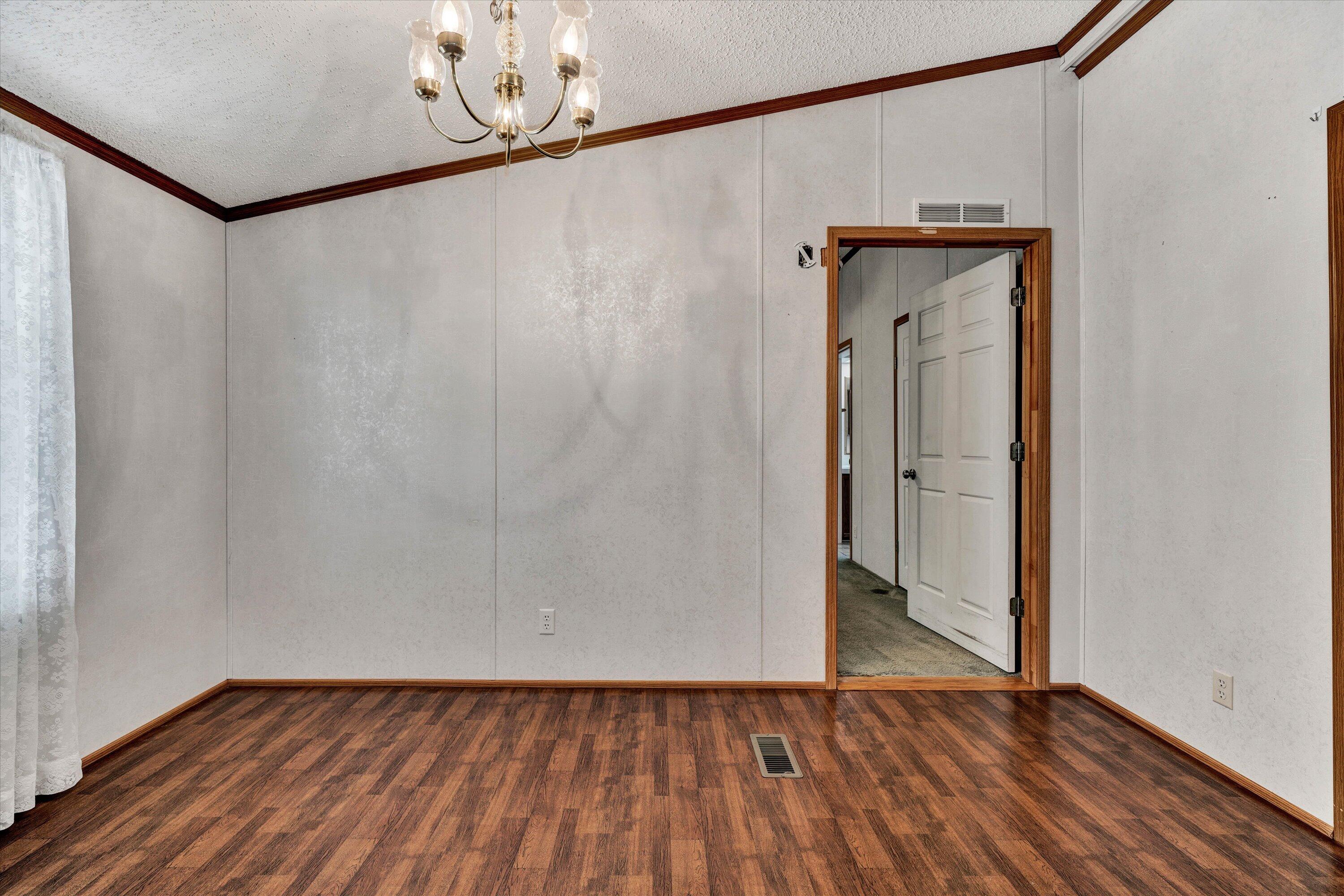 5232 Old Forge Road Rocky Mount, VA 24151 - Photo 17 of 41 a view of a small space with wooden floor and a window