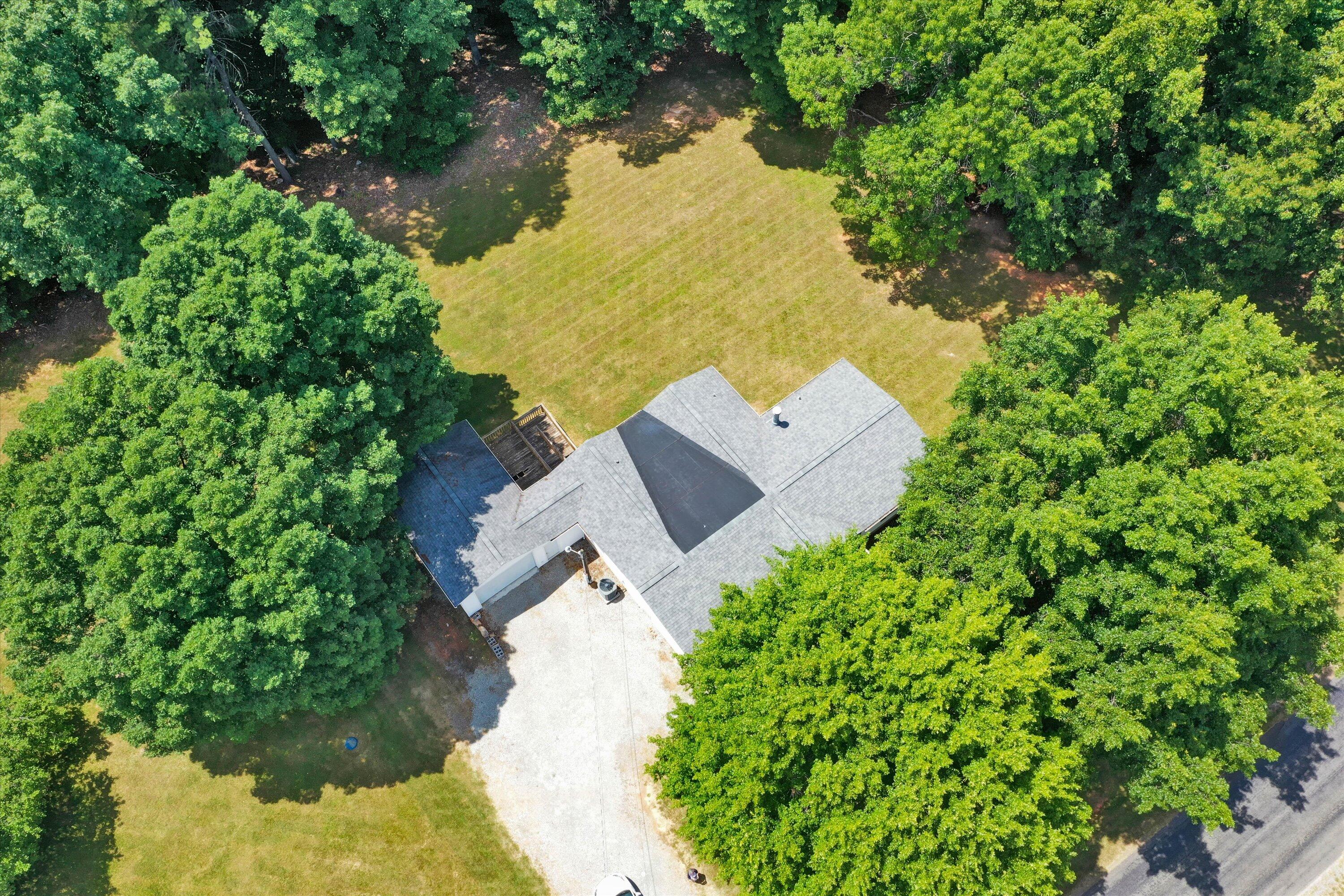 5232 Old Forge Road Rocky Mount, VA 24151 - Photo 2 of 41 an aerial view of a house with a yard and lake view