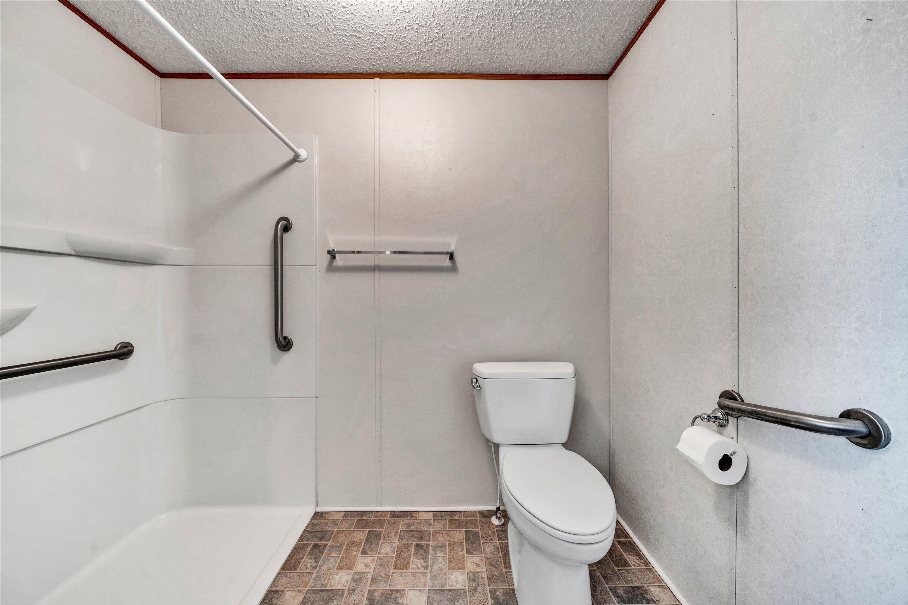 5232 Old Forge Road Rocky Mount, VA 24151 - Photo 22 of 41 a bathroom with a toilet and a shower