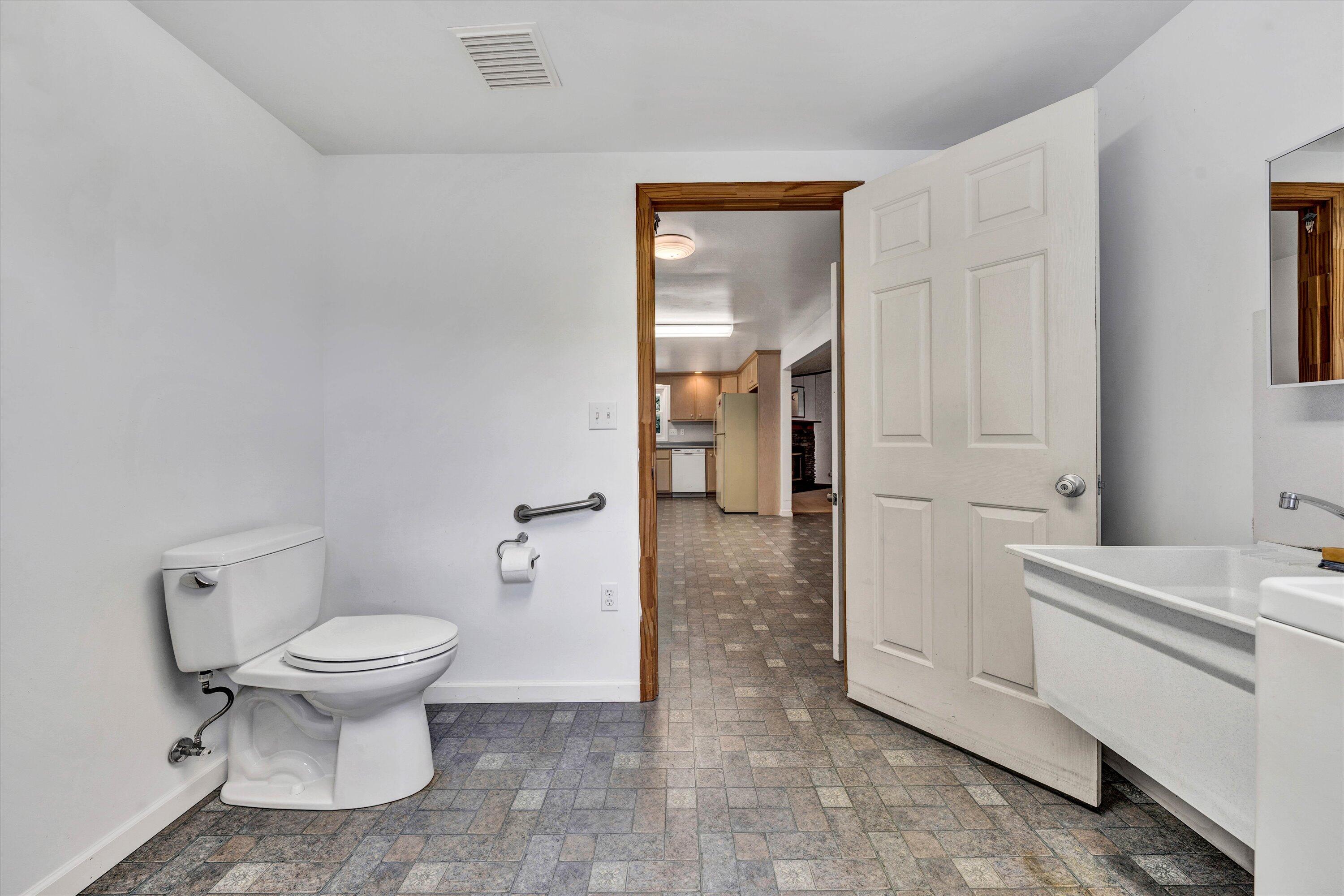 5232 Old Forge Road Rocky Mount, VA 24151 - Photo 30 of 41 a bathroom with a toilet and a sink