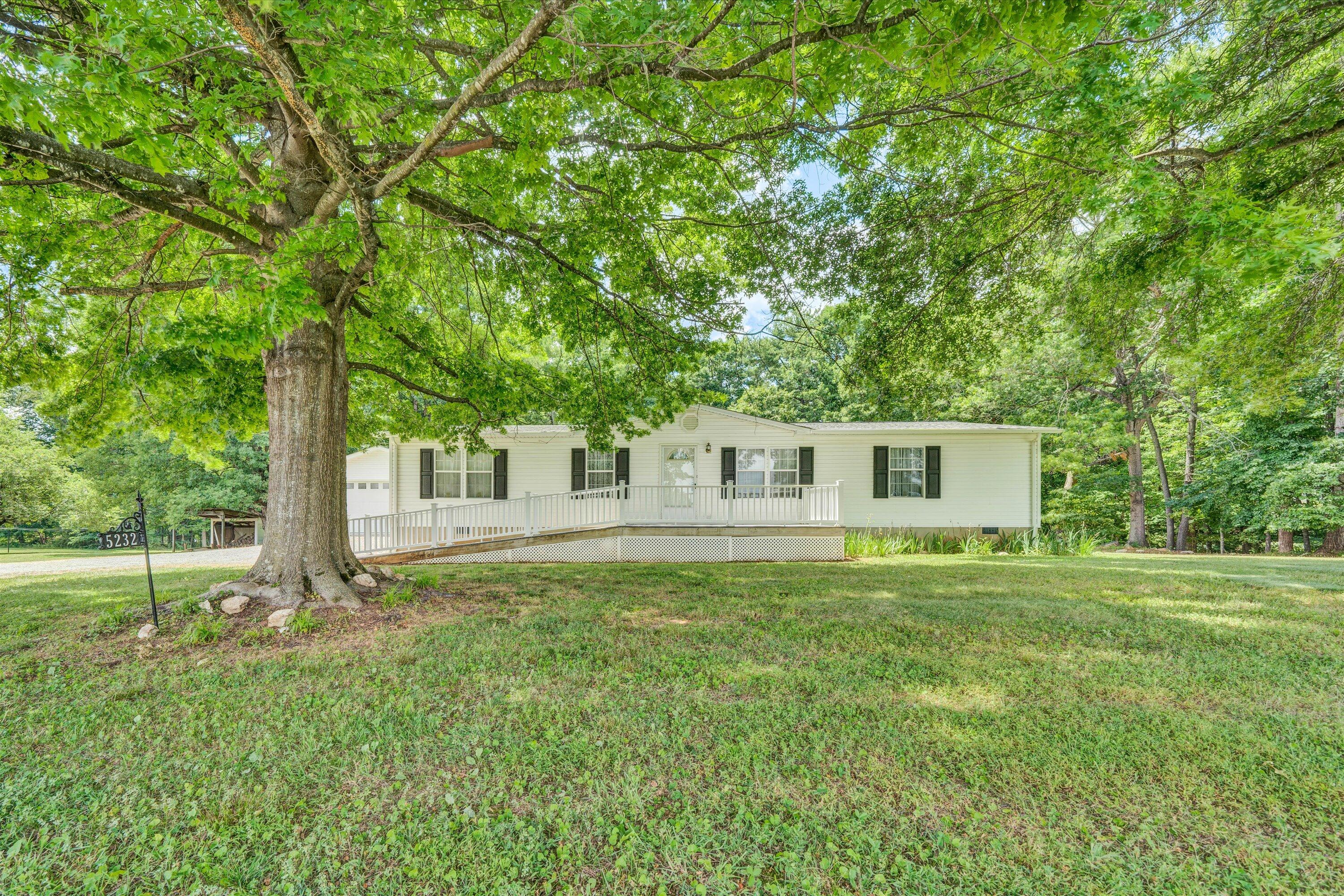 5232 Old Forge Road Rocky Mount, VA 24151 - Photo 35 of 41 a house view with a garden space