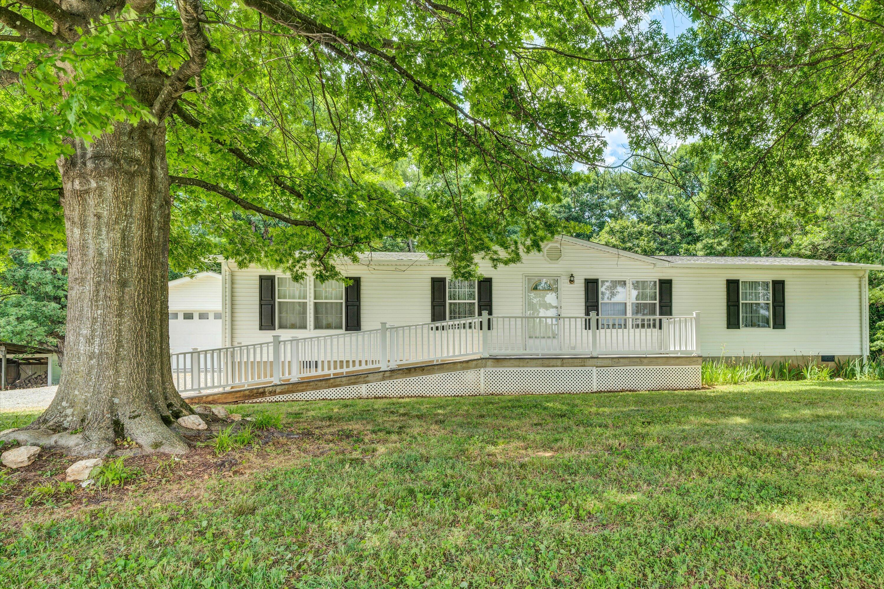5232 Old Forge Road Rocky Mount, VA 24151 - Photo 5 of 41 a front view of a house with a yard