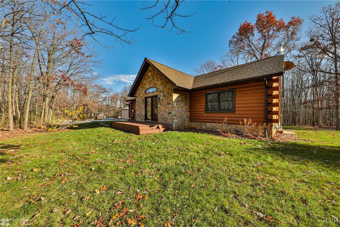 2322 Mountain Road Slatington, PA 18080 - Photo 1 of 42 a front view of a house with a yard