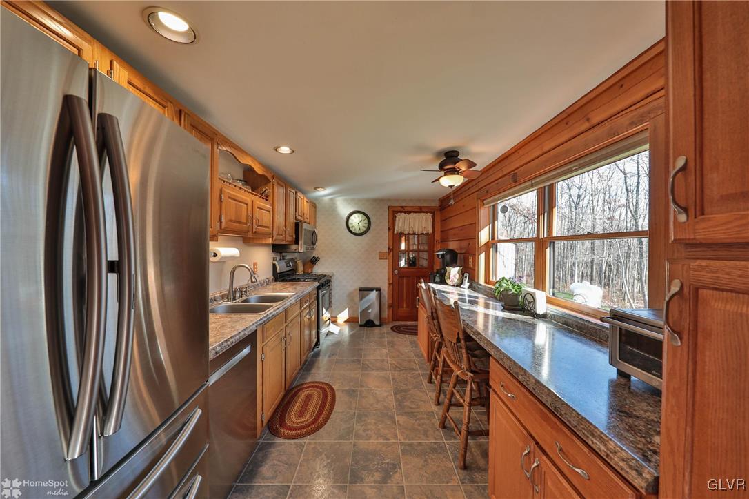 2322 Mountain Road Slatington, PA 18080 - Photo 12 of 42 a kitchen with refrigerator a stove a sink and dishwasher
