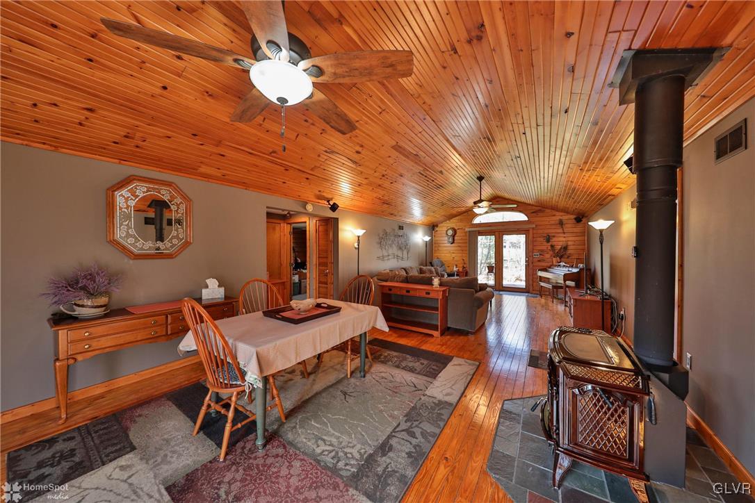 2322 Mountain Road Slatington, PA 18080 - Photo 8 of 42 a living room with furniture a flat screen tv and a table