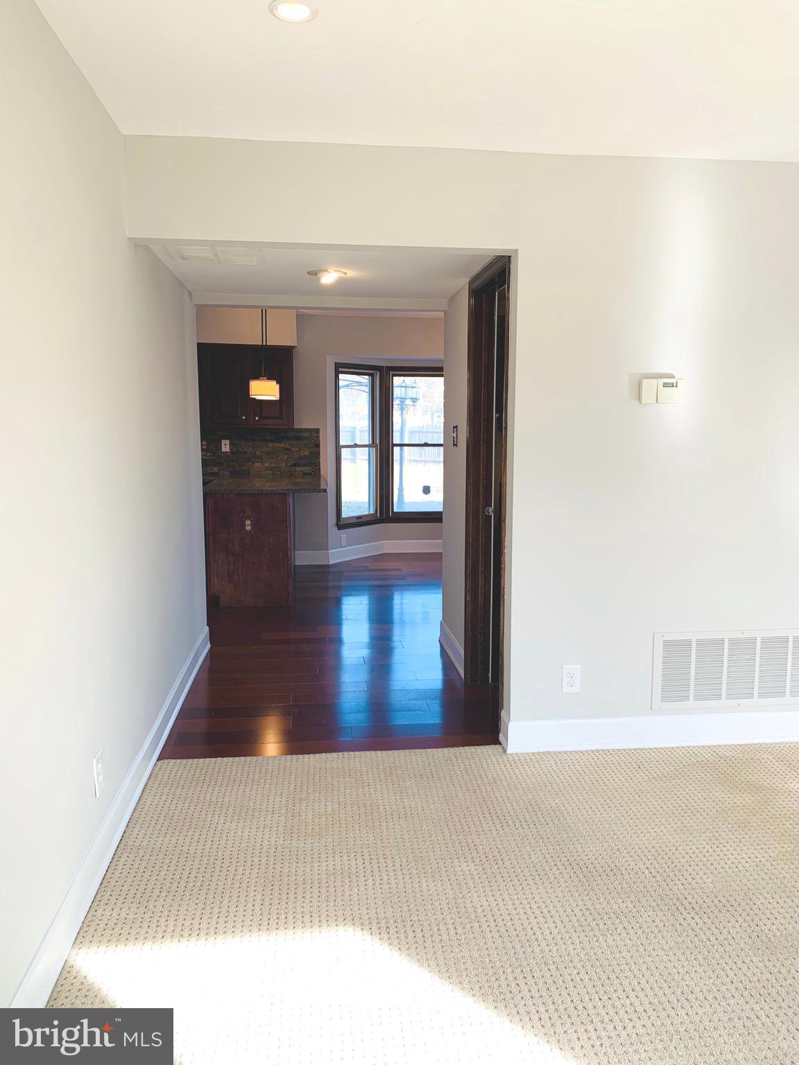 36 Manchester Road Mount Holly, NJ 08060 - Photo 5 of 31 DINING ROOM TO KITCHEN & POWDER ROOM