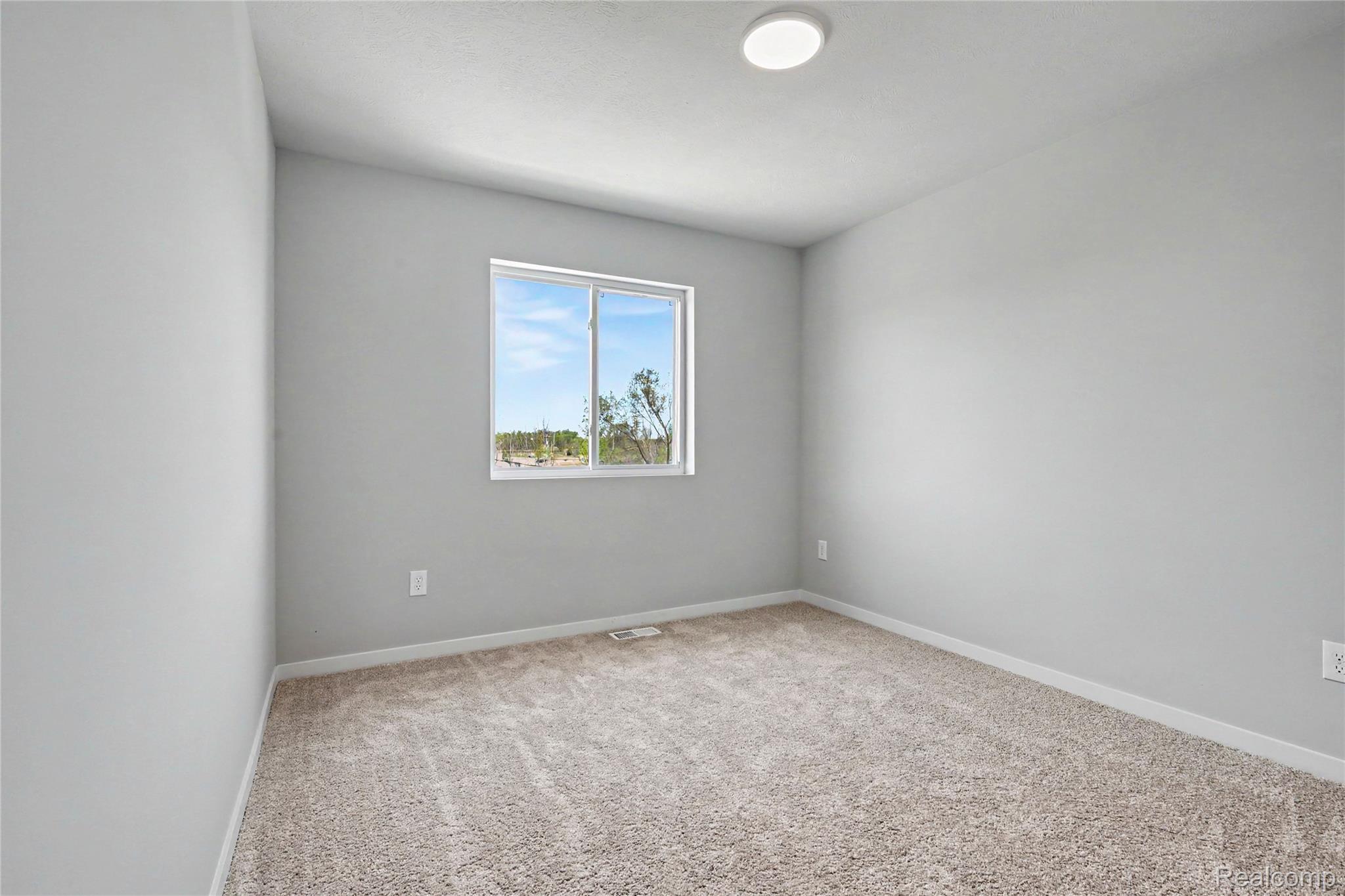 1230 Lockes Street Howell, MI 48843 - Photo 15 of 27 Stock Photo-Bedroom 4