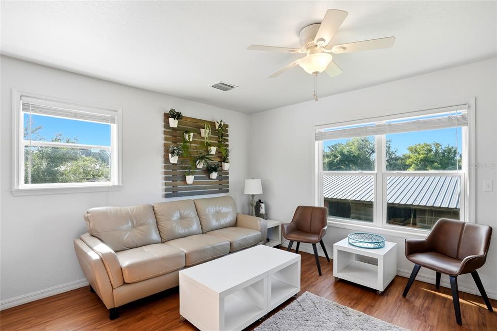 123 South Wiggins Road Plant City, FL 33566 - Photo 25 of 55 a living room with furniture and a large window