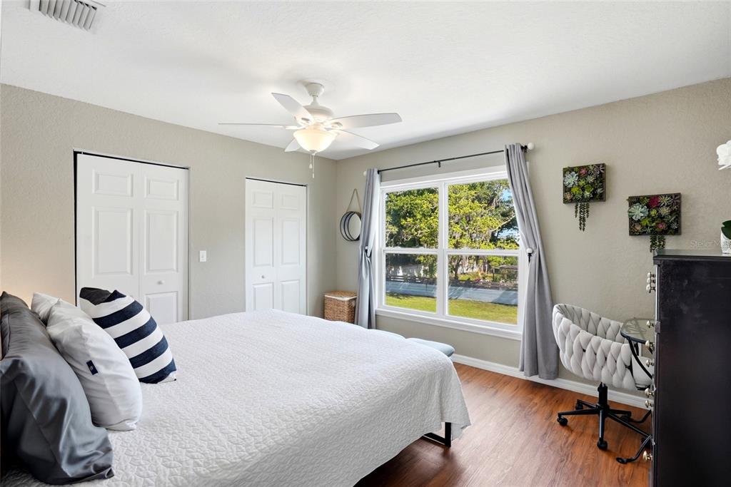 123 South Wiggins Road Plant City, FL 33566 - Photo 30 of 55 a bedroom with a bed and a large window