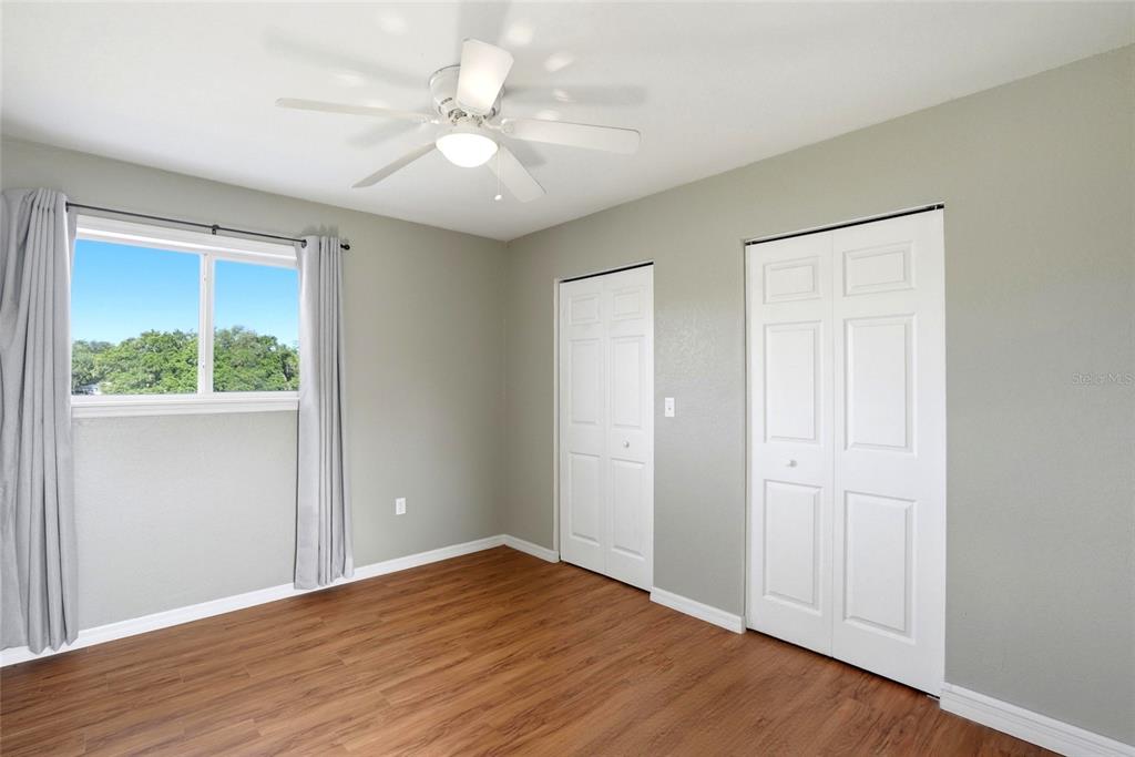 123 South Wiggins Road Plant City, FL 33566 - Photo 32 of 55 a view of an empty room with wooden floor
