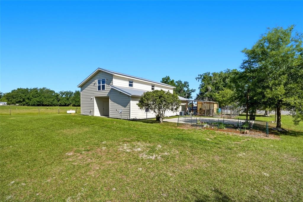 123 South Wiggins Road Plant City, FL 33566 - Photo 42 of 55 a view of a house with a big yard