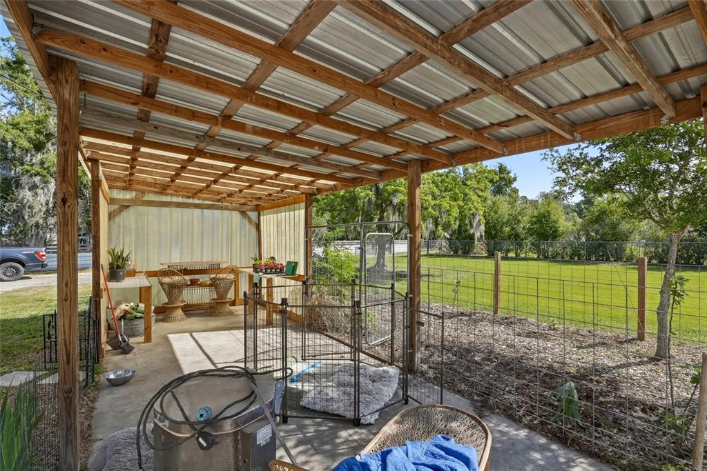 123 South Wiggins Road Plant City, FL 33566 - Photo 46 of 55 a view of swimming pool with outdoor seating and yard