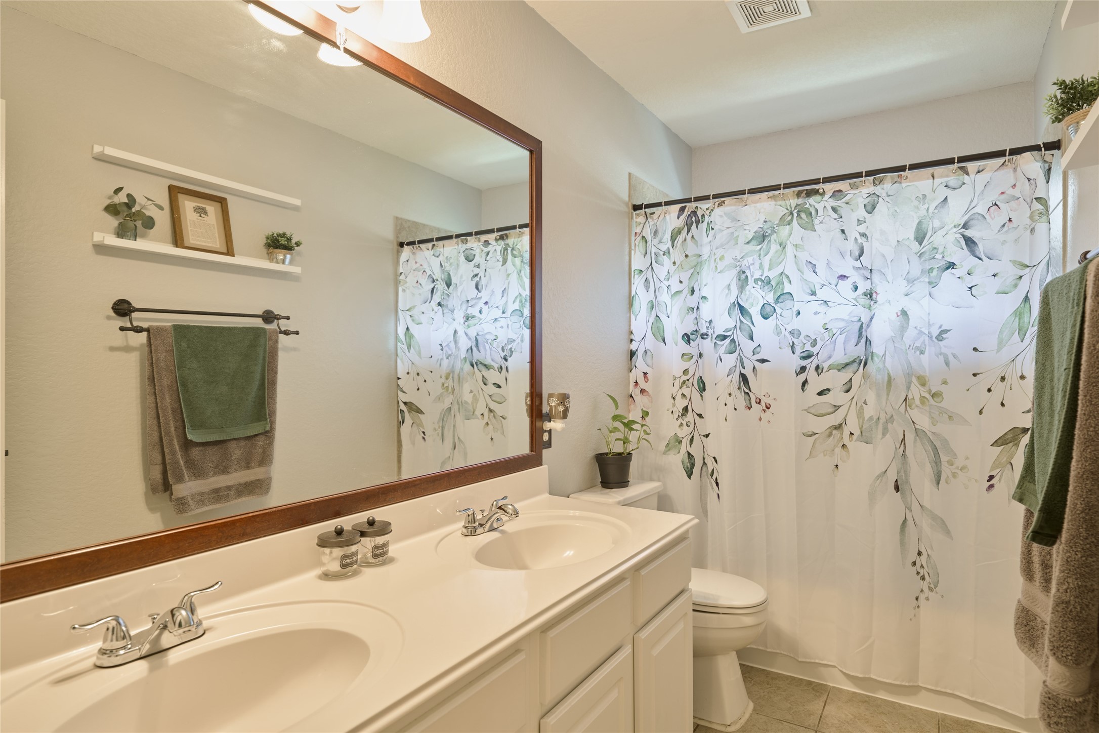 28322 Madelin Manor Lane Spring, TX 77386 - Photo 22 of 46 a bathroom with a sink toilet and shower