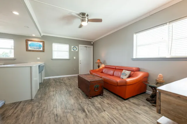 a living room with furniture and a window