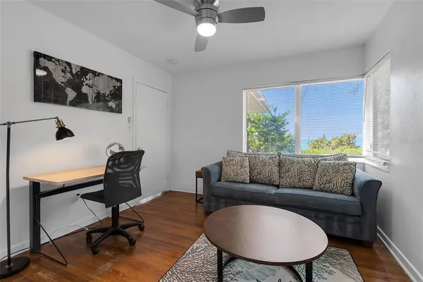 a living room with furniture and a window