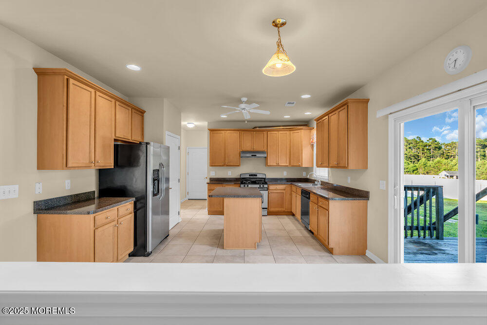 6 Eagle Ridge Lane West Creek, NJ 08092 - Photo 17 of 61 a kitchen with a refrigerator and a sink