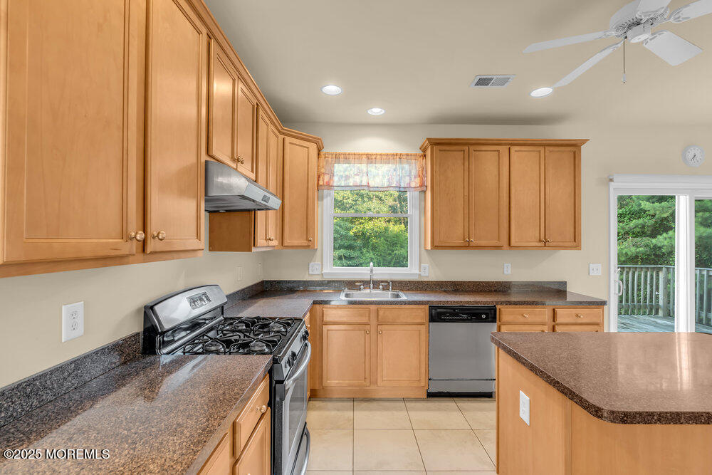 6 Eagle Ridge Lane West Creek, NJ 08092 - Photo 22 of 61 a kitchen with a sink stove and cabinets