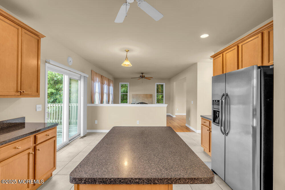 6 Eagle Ridge Lane West Creek, NJ 08092 - Photo 24 of 61 a large kitchen with kitchen island a large window appliances and cabinets