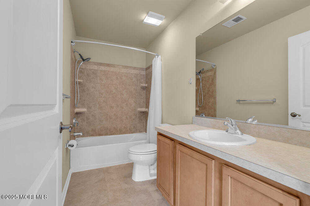 6 Eagle Ridge Lane West Creek, NJ 08092 - Photo 29 of 61 a bathroom with a sink a toilet and shower
