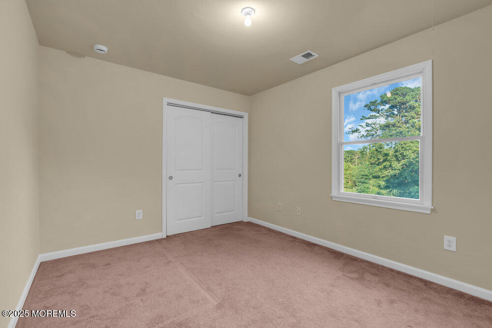 6 Eagle Ridge Lane West Creek, NJ 08092 - Photo 35 of 61 an empty room with windows