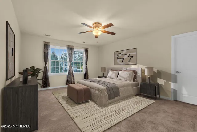a bathroom with a toilet sink and a mirror