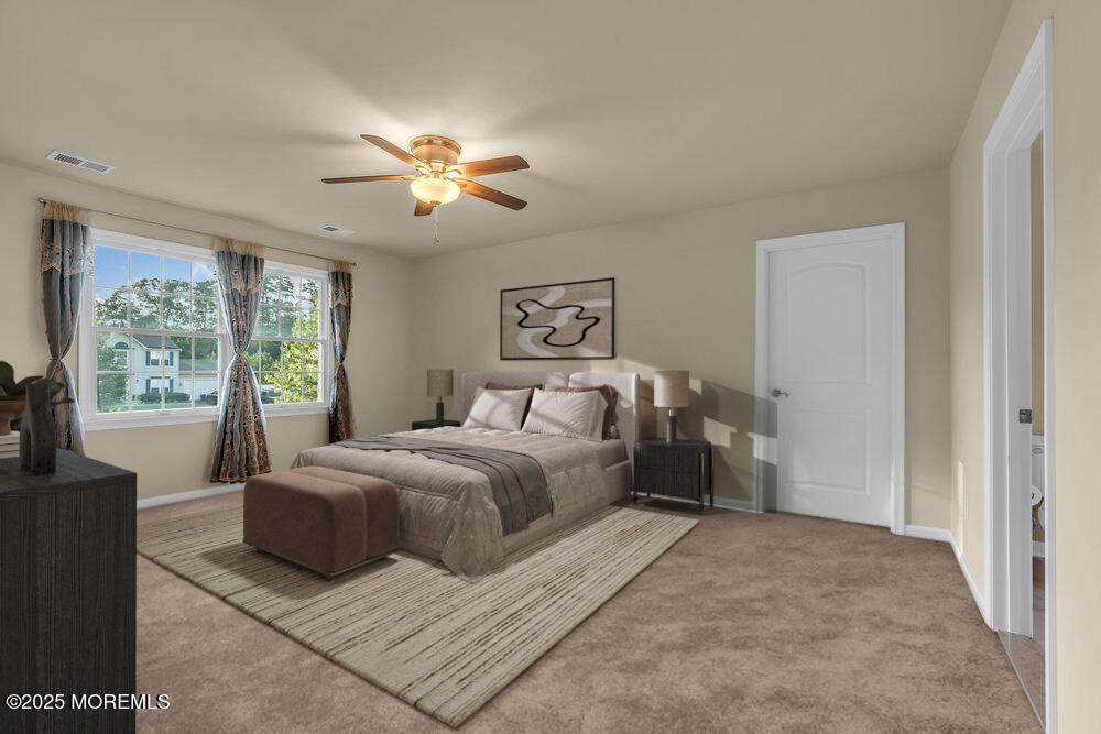 6 Eagle Ridge Lane West Creek, NJ 08092 - Photo 38 of 61 a spacious bedroom with a large bed and a chandelier