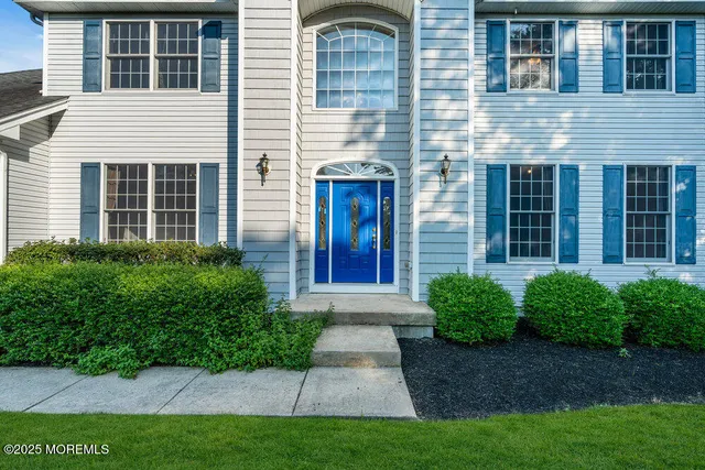 a view of a pathway with a backyard