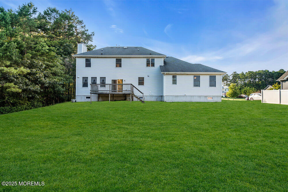 6 Eagle Ridge Lane West Creek, NJ 08092 - Photo 50 of 61 a front view of a house with a yard and trees