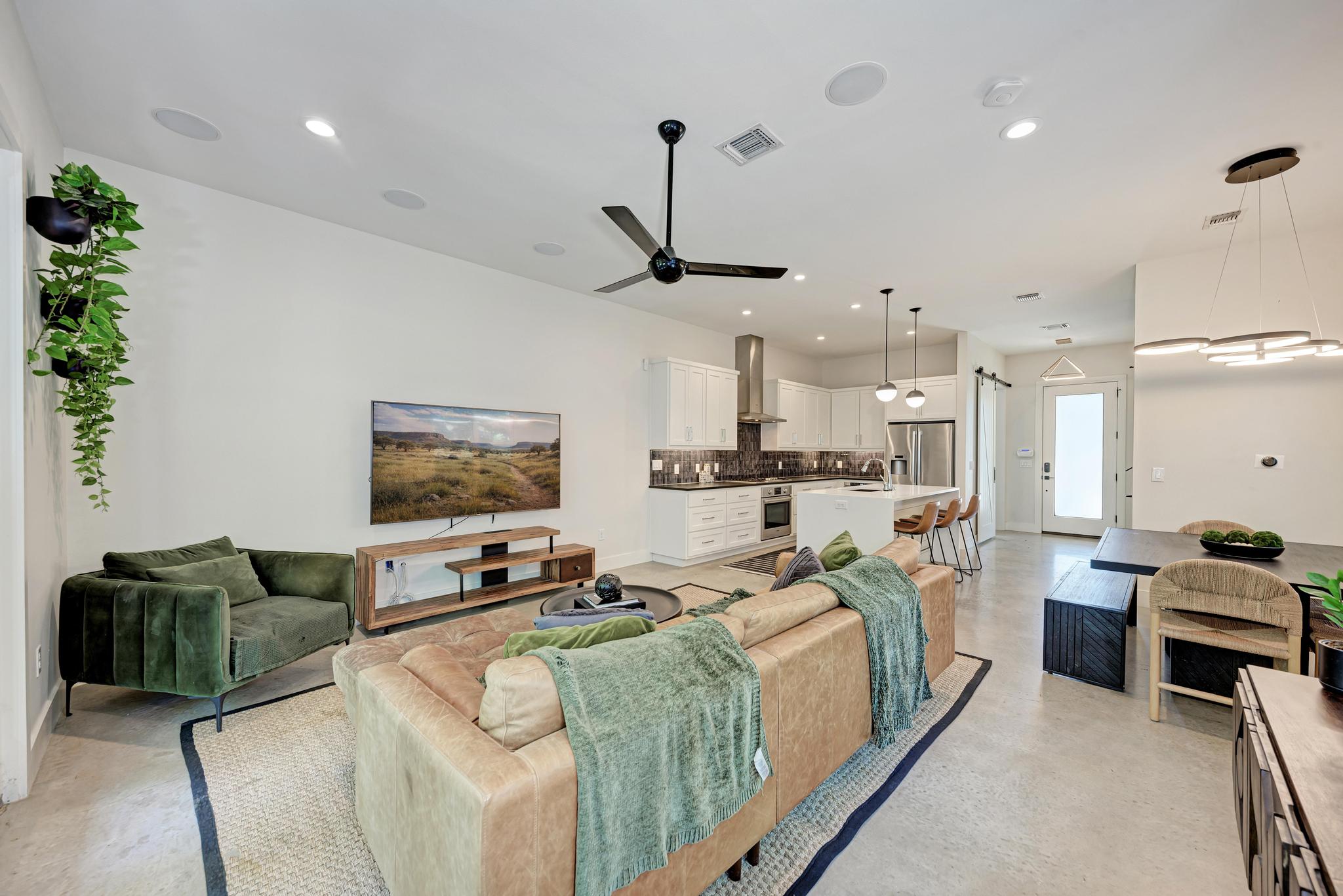 918 Cardinal Lane, Unit A Austin, TX 78704 - Photo 40 of 40 Open floor plan living creates an atmosphere built for dinner parties, Sunday mornings, and everything in between.