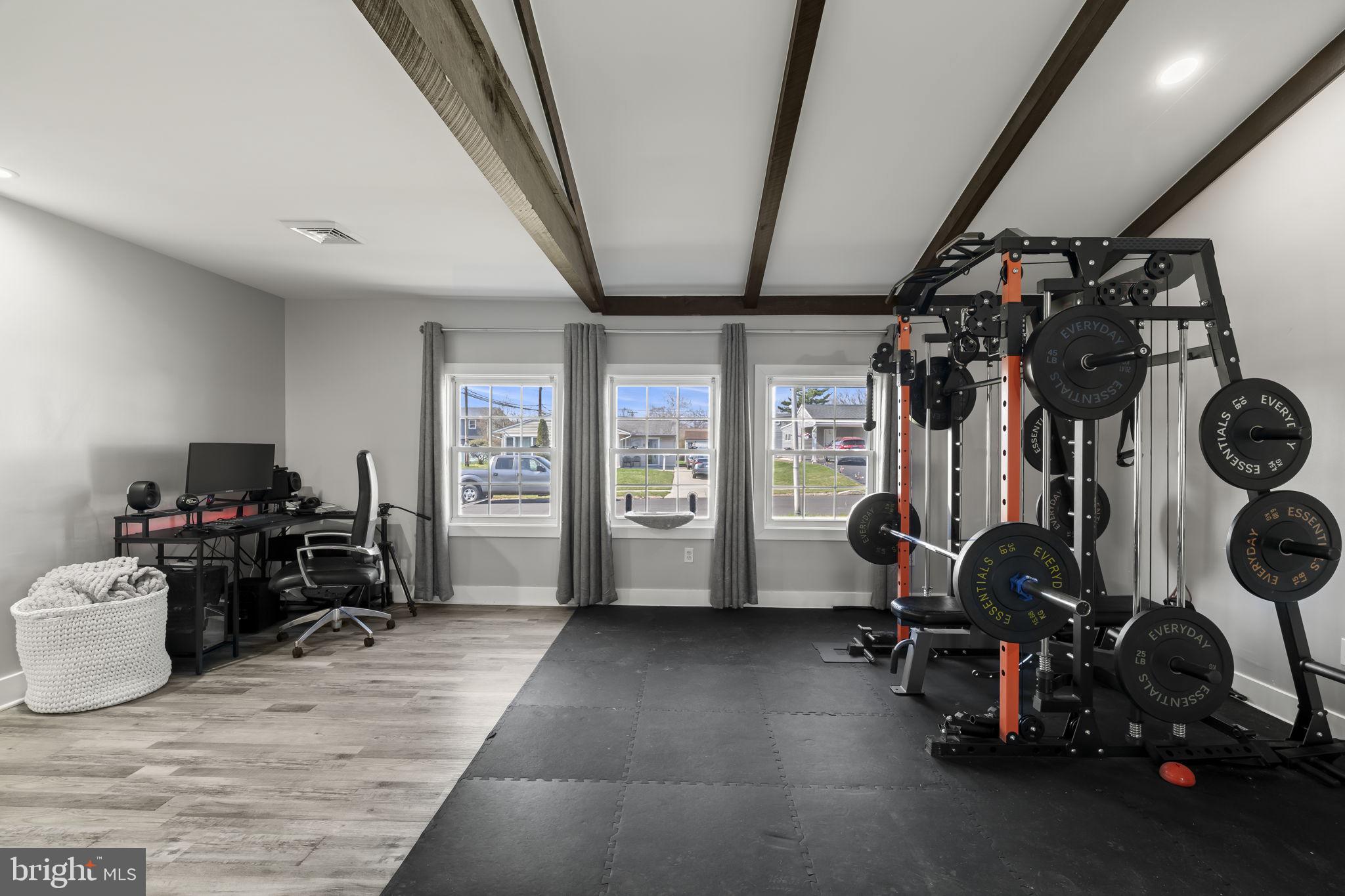 6 Black Walnut Road Levittown, PA 19057 - Photo 13 of 31 Modern fitness space with natural light.