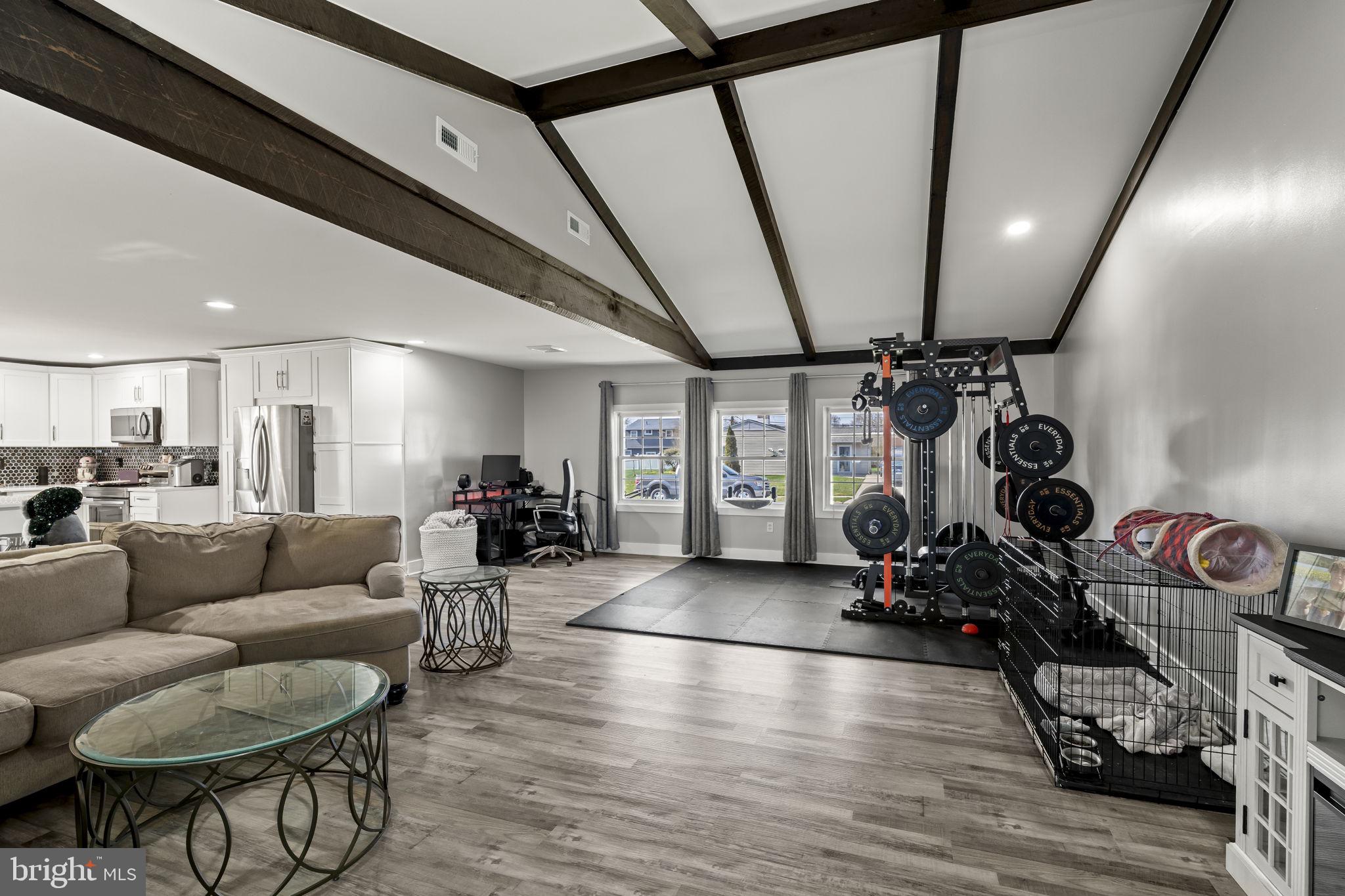 6 Black Walnut Road Levittown, PA 19057 - Photo 14 of 31 Spacious living area with vaulted beams.