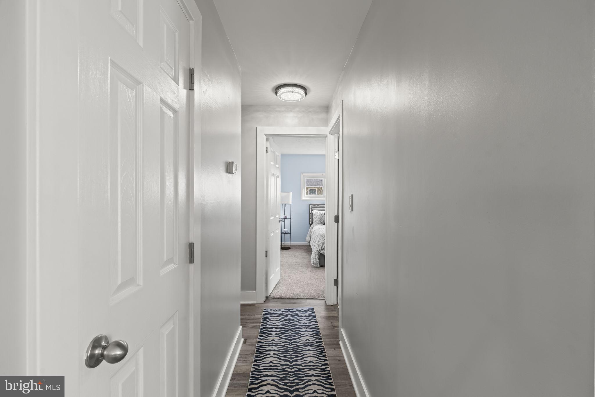 6 Black Walnut Road Levittown, PA 19057 - Photo 18 of 31 Inviting hallway with modern charm.