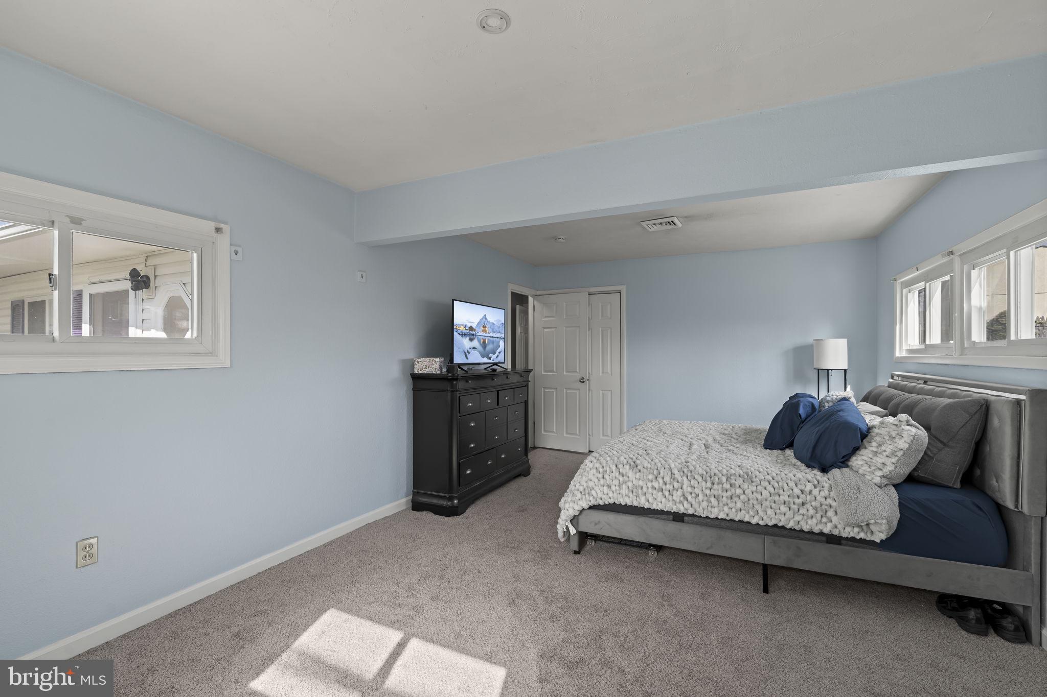 6 Black Walnut Road Levittown, PA 19057 - Photo 22 of 31 Serene blue-hued bedroom retreat.
