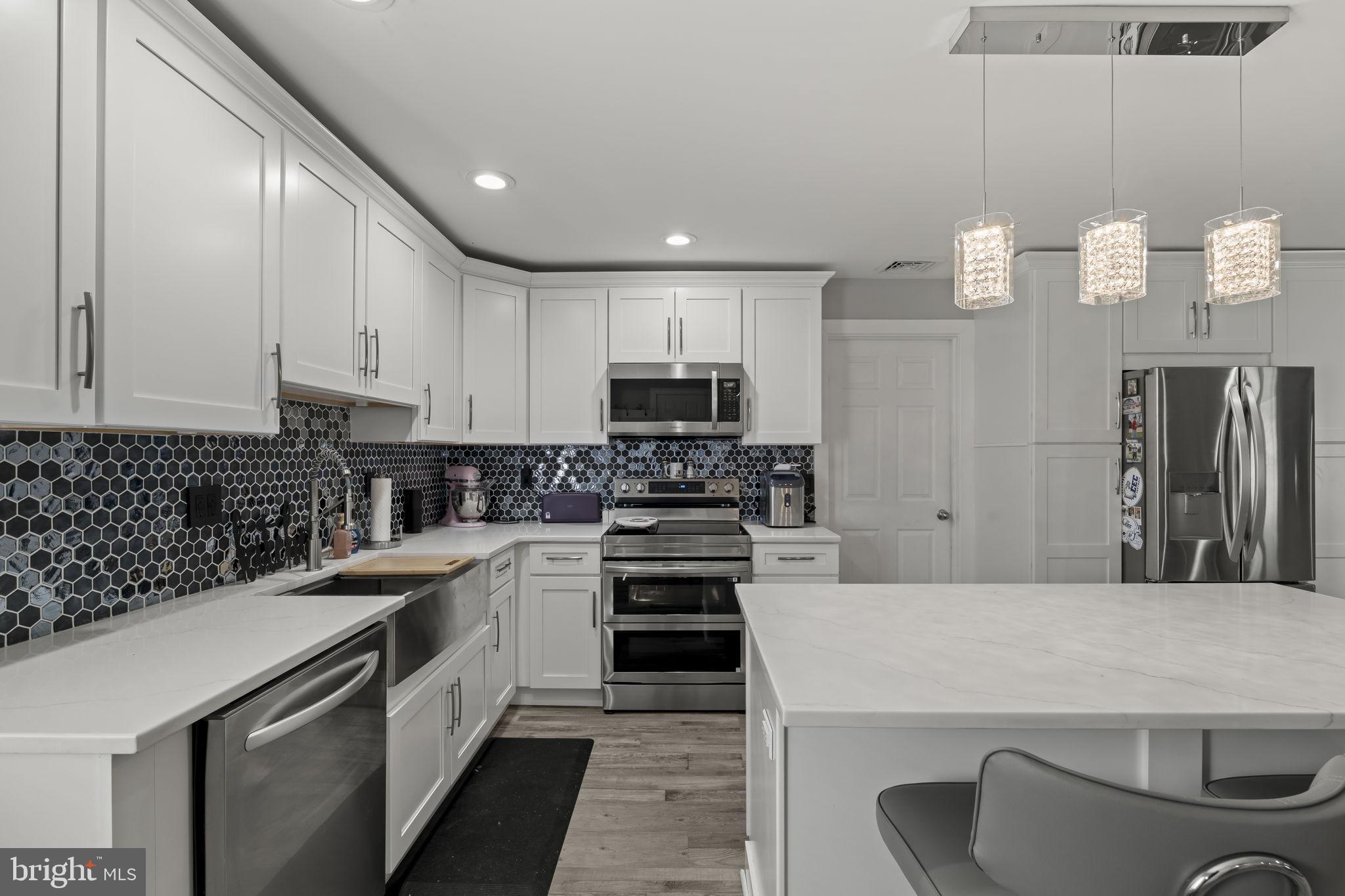 6 Black Walnut Road Levittown, PA 19057 - Photo 7 of 31 Sleek modern kitchen with stylish accents.