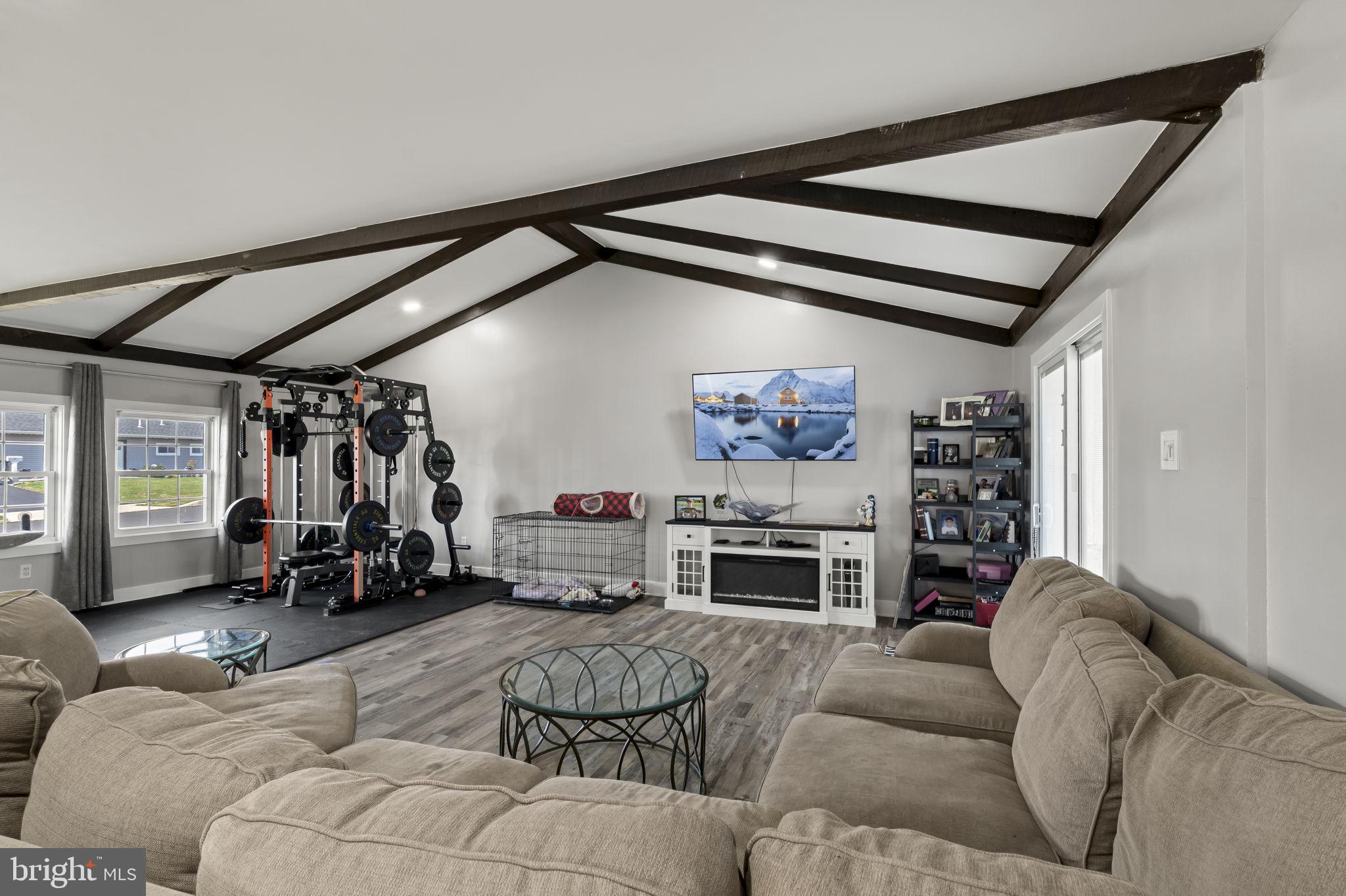 6 Black Walnut Road Levittown, PA 19057 - Photo 10 of 31 Spacious living area with gym setup.