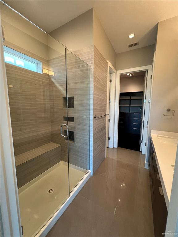 4208 Wichita Avenue McAllen, TX 78503 - Photo 17 of 24 a bathroom with a tub and shower