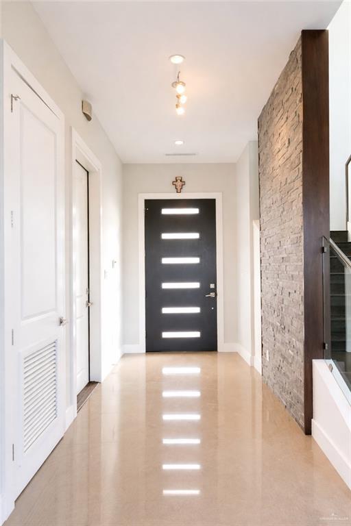 4208 Wichita Avenue McAllen, TX 78503 - Photo 2 of 24 a view of a hallway view with staircase