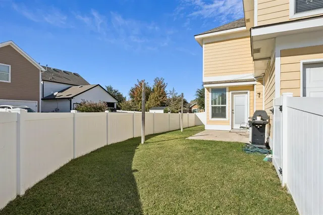 a house view with a backyard space