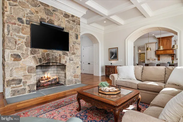 a view of an entryway with wooden floor and staircase