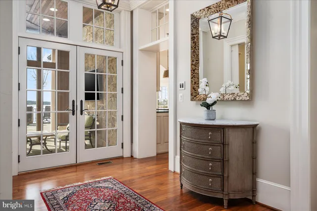 a view of a swimming pool with a patio and a garden