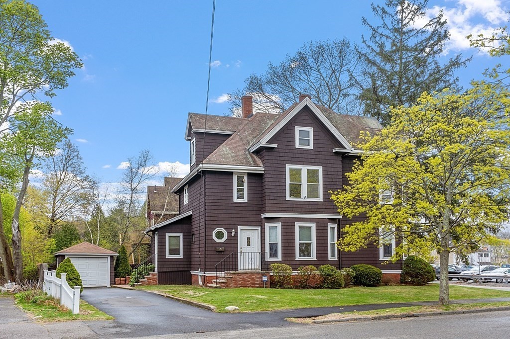 2 Bond Place Saugus, MA 01906 - Photo 1 of 42 a front view of a house with a yard