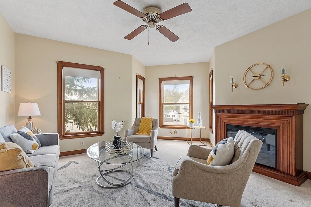 2 Bond Place Saugus, MA 01906 - Photo 17 of 42 a living room with furniture and a fireplace