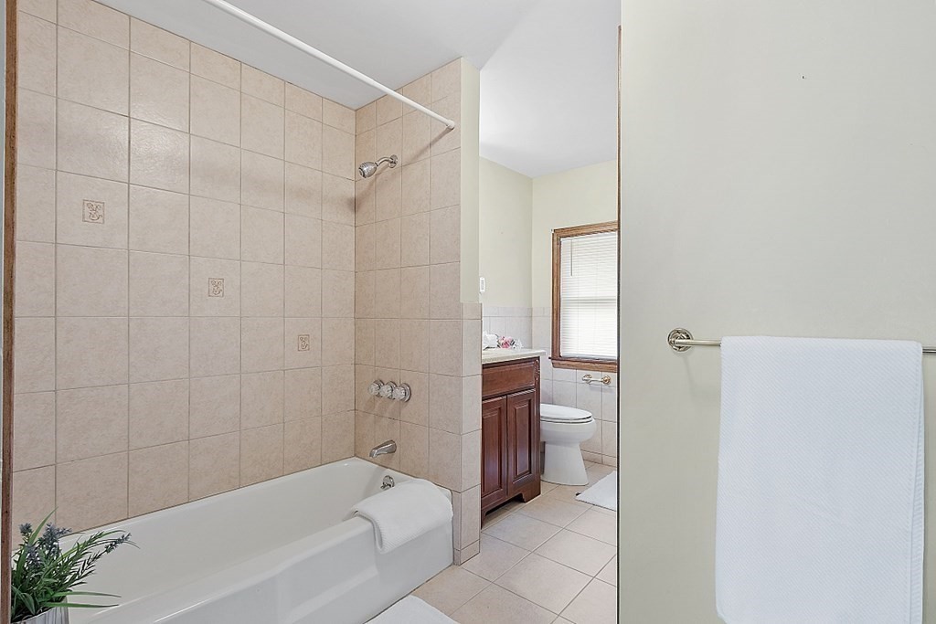 2 Bond Place Saugus, MA 01906 - Photo 24 of 42 a bathroom with a bathtub and a shower