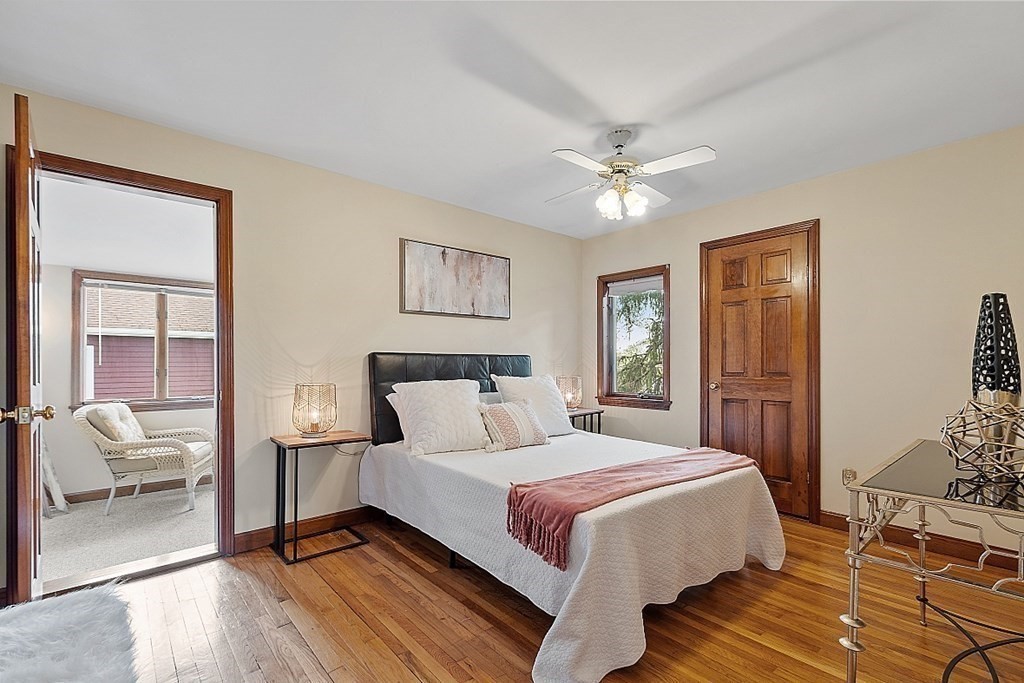2 Bond Place Saugus, MA 01906 - Photo 26 of 42 a bedroom with a large bed couch and two windows