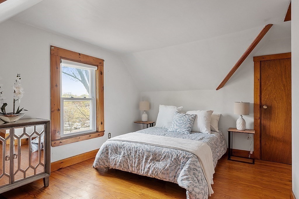 2 Bond Place Saugus, MA 01906 - Photo 30 of 42 a bedroom with a large bed and a window