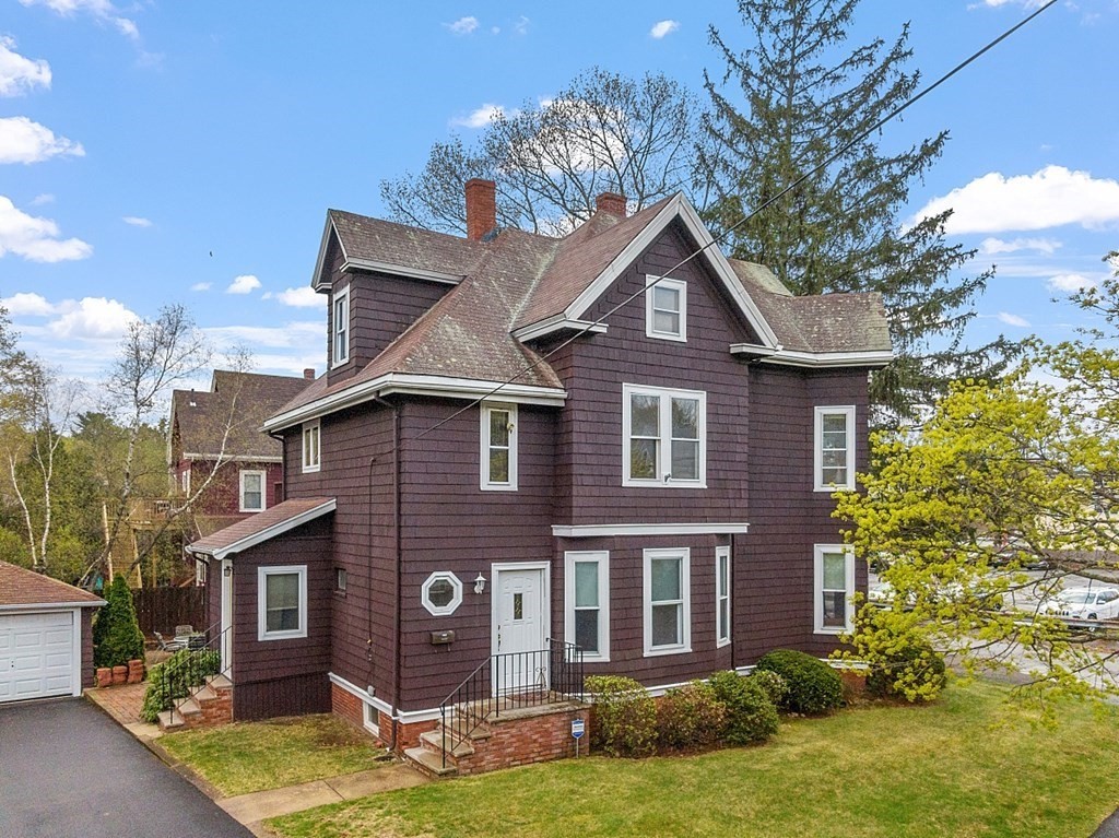 2 Bond Place Saugus, MA 01906 - Photo 3 of 42 a front view of a house with garden