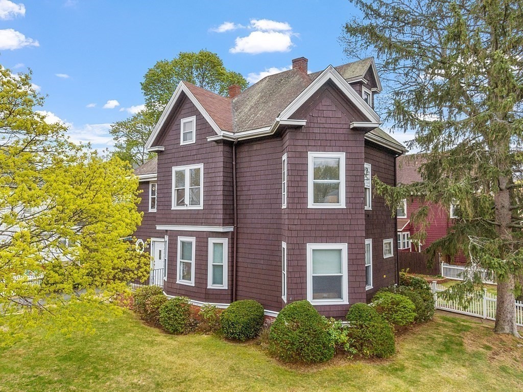 2 Bond Place Saugus, MA 01906 - Photo 35 of 42 a front view of a house with yard and green space