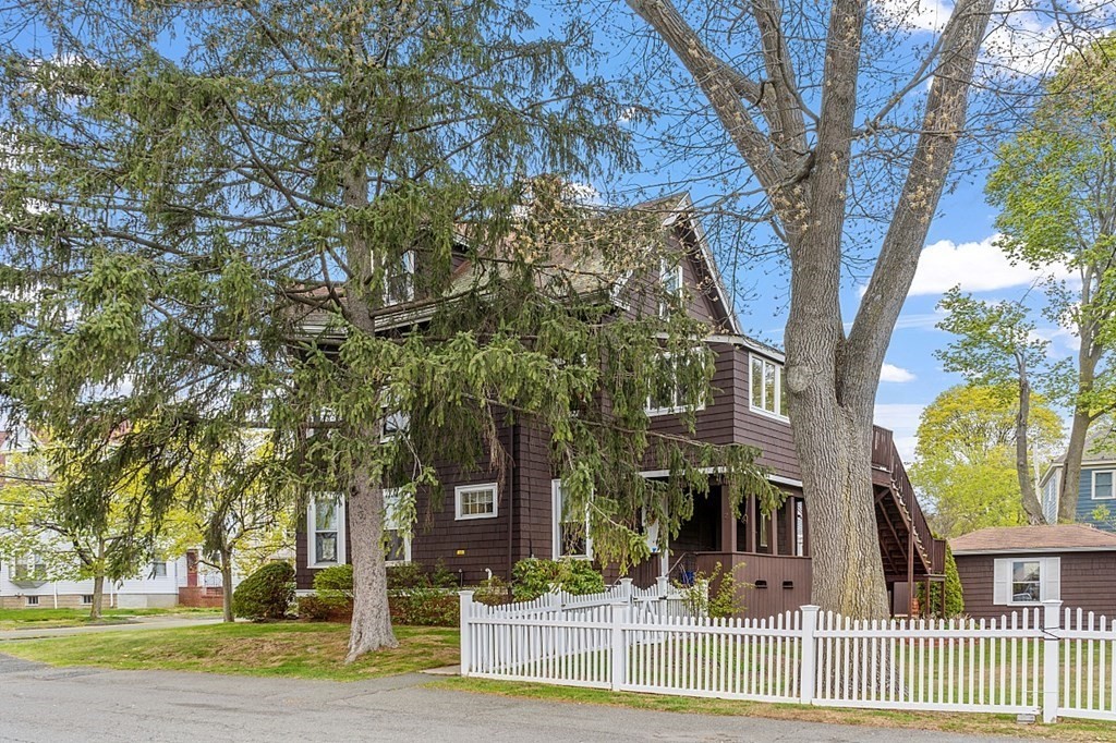 2 Bond Place Saugus, MA 01906 - Photo 4 of 42 front view of a house with a tree