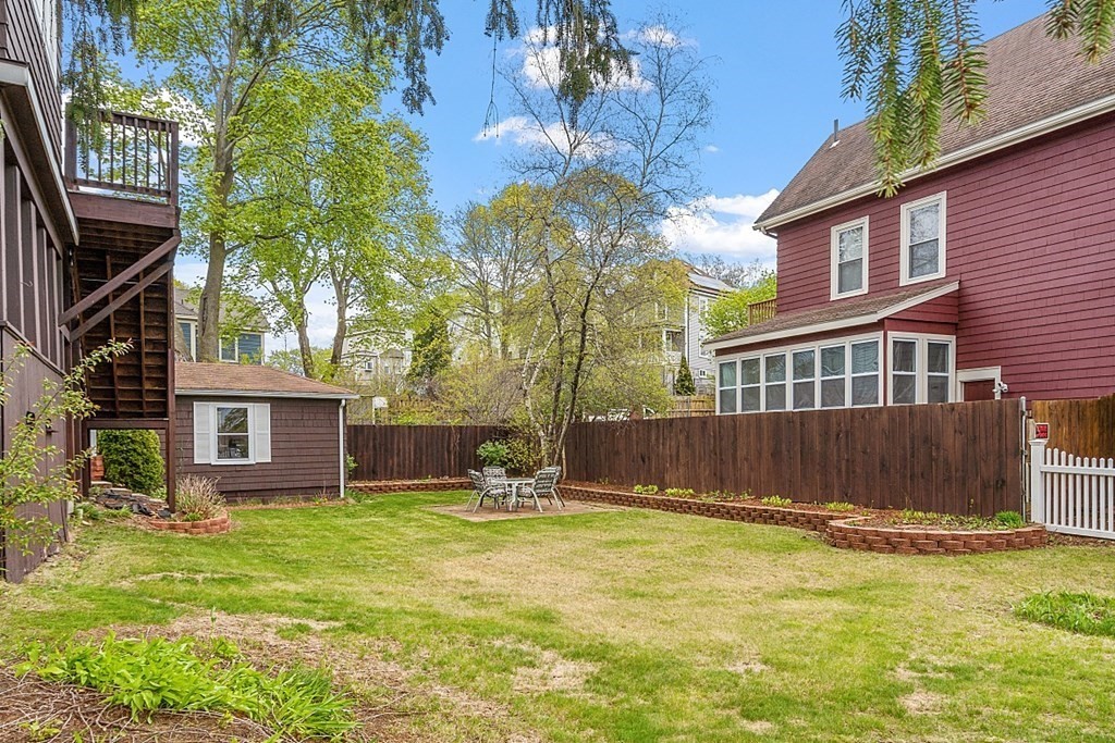 2 Bond Place Saugus, MA 01906 - Photo 5 of 42 front view of a house with a yard